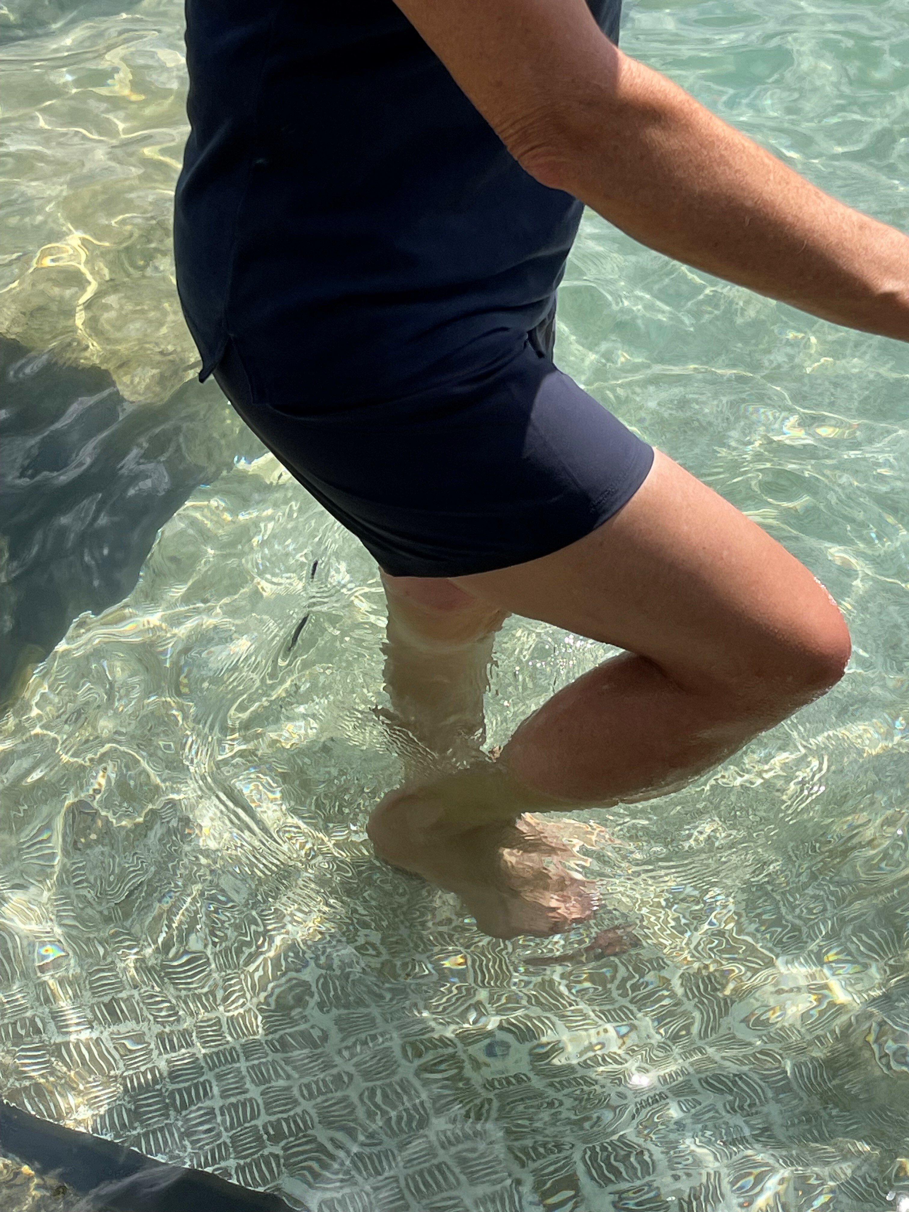 Dip your legs and arms in Lake Thun